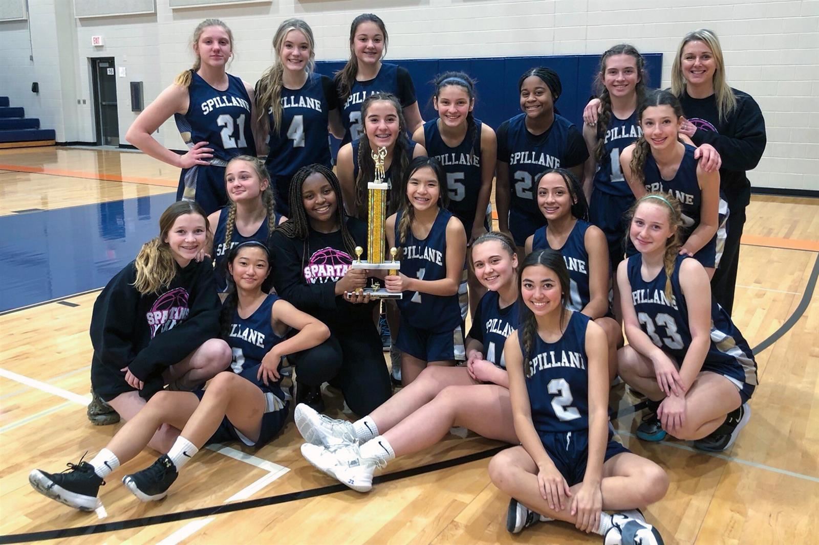 The Spillane Spartans’ eighth grade B team won the West Division girls’ basketball title with a 5-0 record.